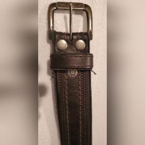 Black leather over canvas Belt. BKE (Buckle)